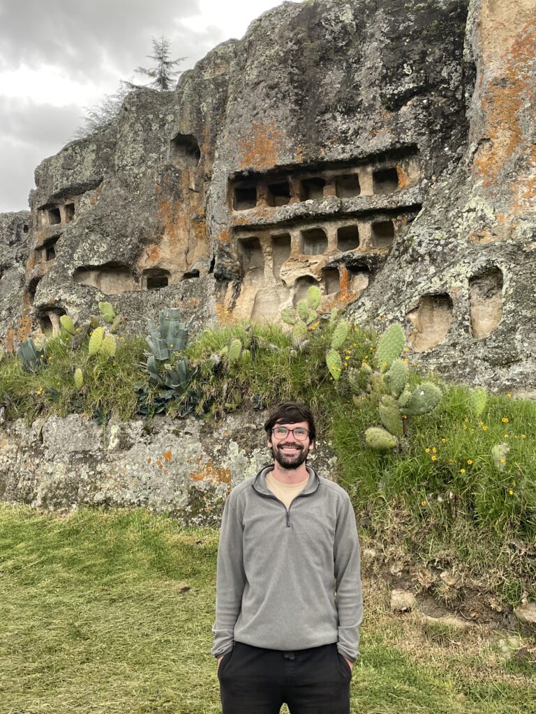 Dan stood in front of the Ventanillas de Otuzco. The structure is made up of little windows carved into volcanic rock.