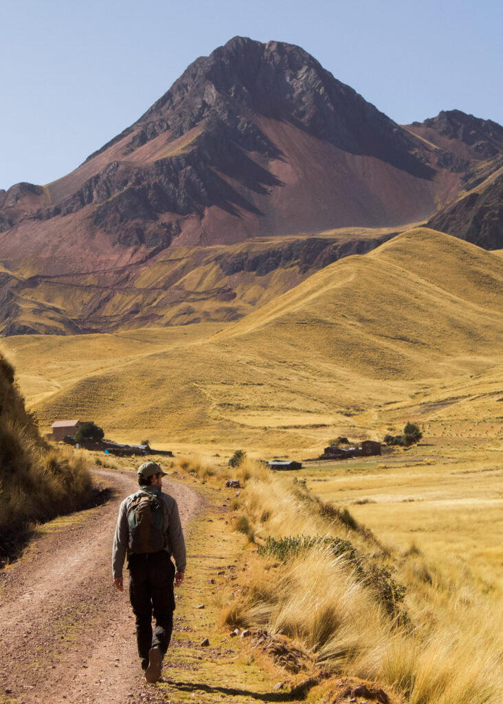 Dan hiking the first section of Pallay Punchu. In the background you can see the switchbacks leading up the mountain. 