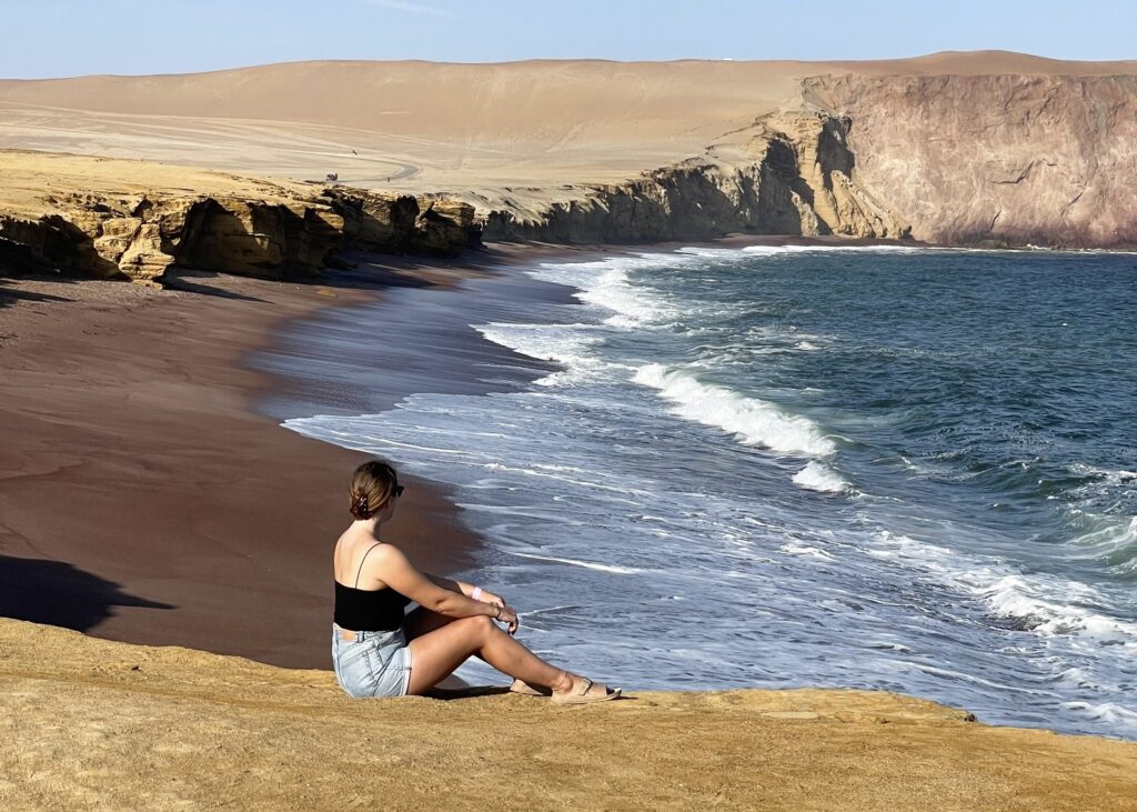 Megan sat looking over Playa Roja and the rugged cliff sides. Arguably one of the best things to do in Paracas.