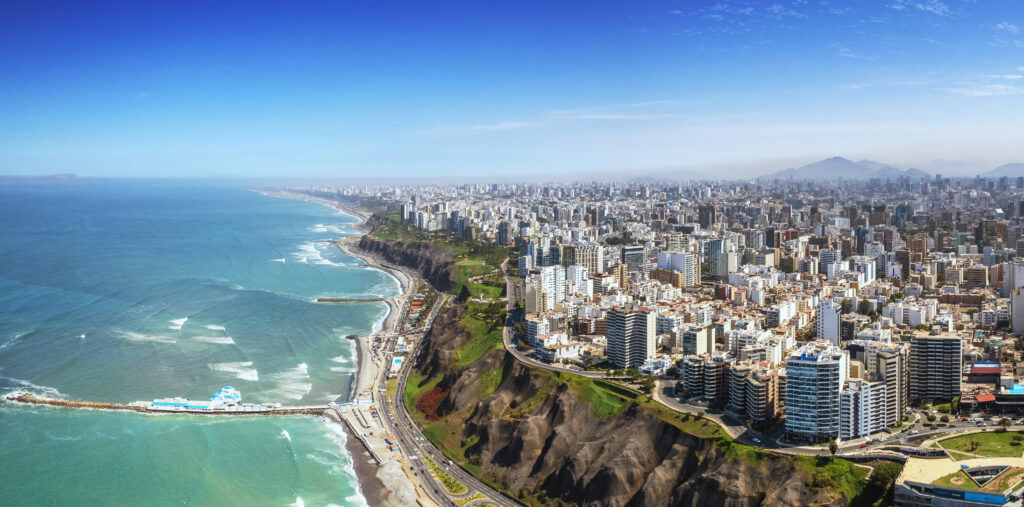 Drone view of Lima City looking onto the Pacific Coast and the Costa Verde Cliffs