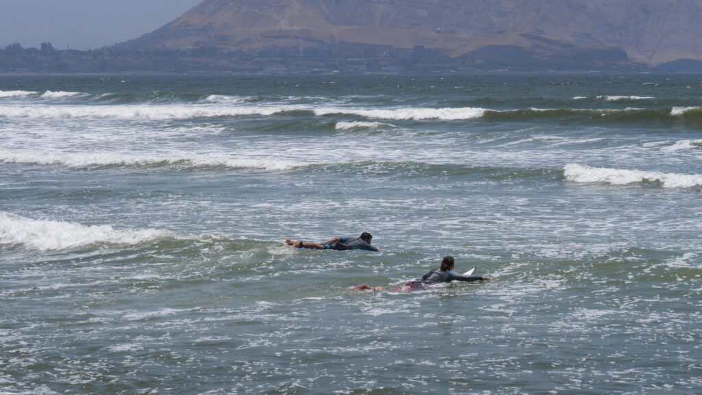 Surfers on Limas beaches 