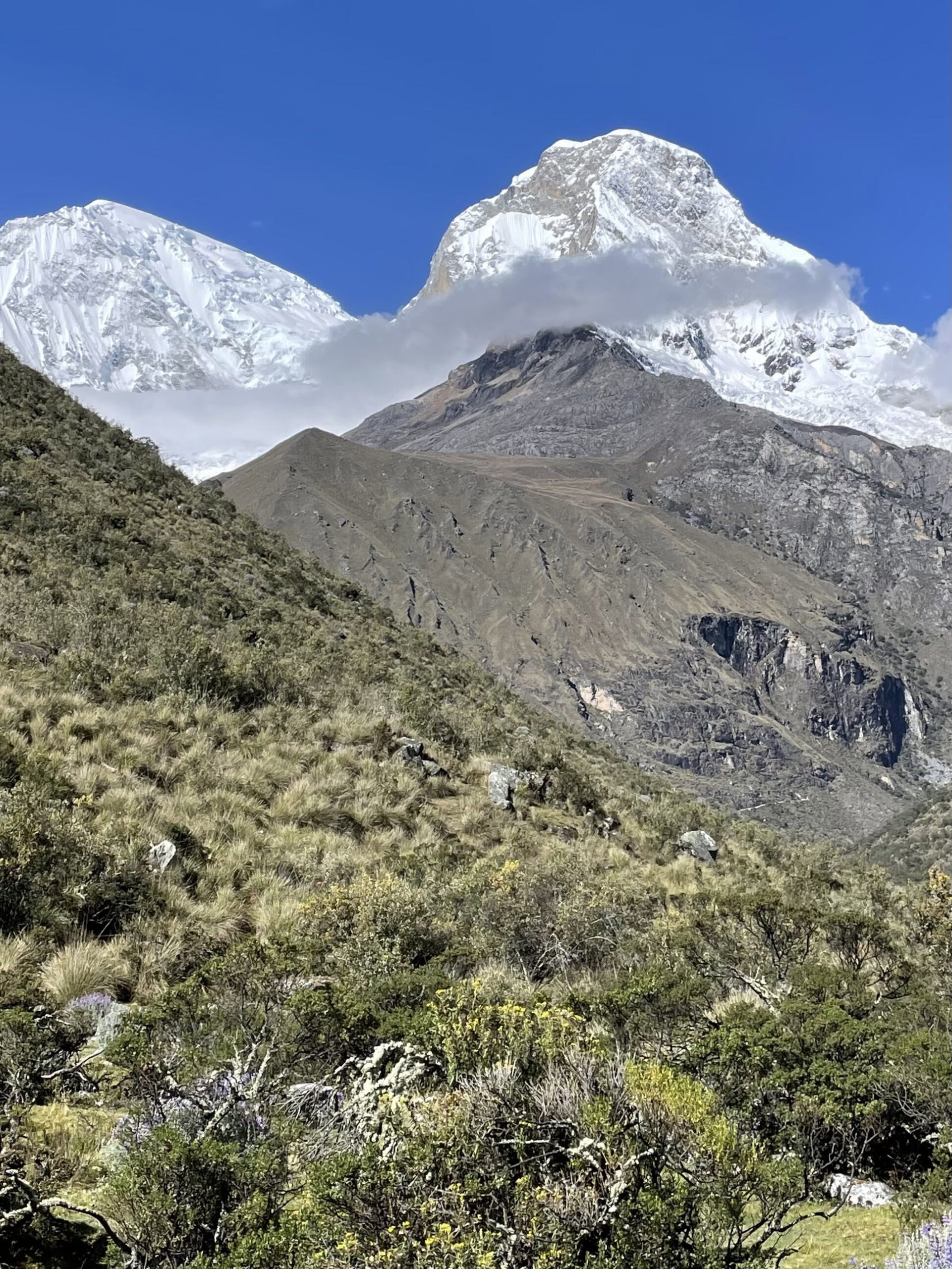 Huge snow-capped mountains on the way up to Laguna 69. 