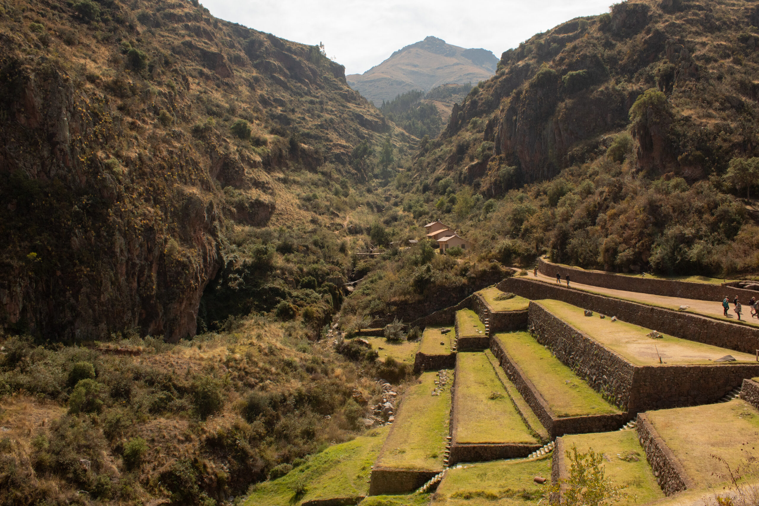 A section of the upper part of Pisac Ruins with terraces leading to a river.  